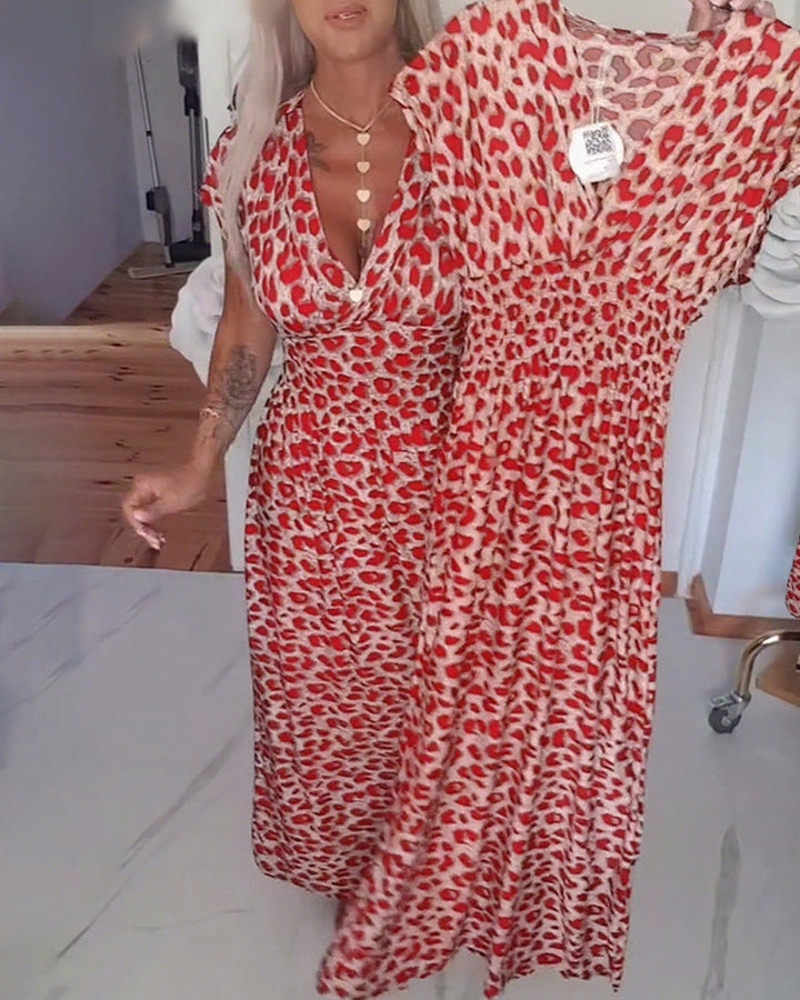 Elegantes Kleid mit Leopardenmuster und V-Ausschnitt MOKKAKAI